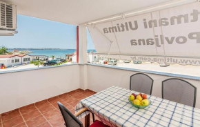 Amazing Apartment In Povljana With House Sea View